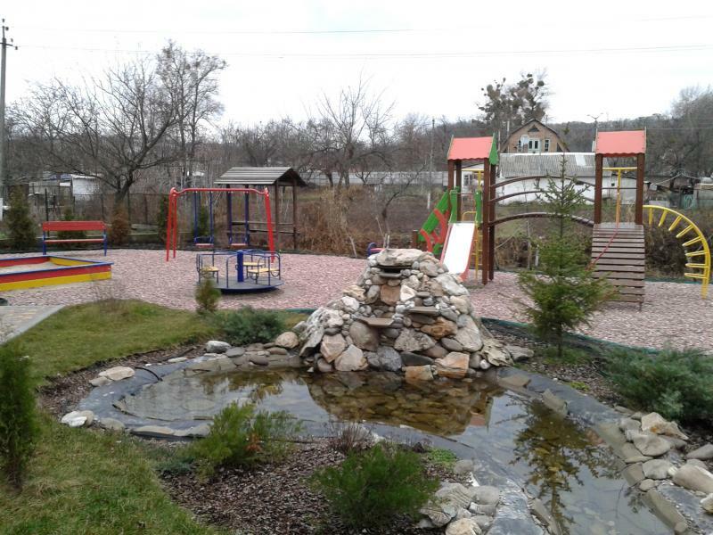 Київська обл., Обухівський район, смт Козин, Київська вул., 128