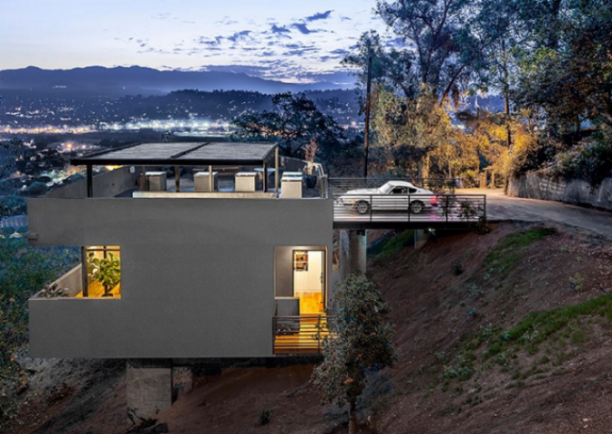 Дом с крышей-парковкой