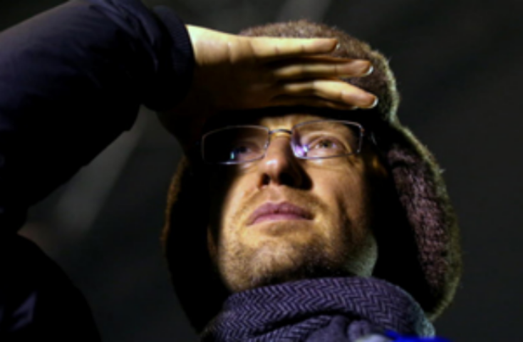 Со свечой у печки