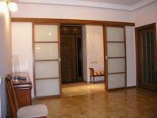 Как увеличить пространство при помощи раздвижных дверей