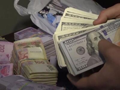 "Черные" менялы стали нападать на киевлян