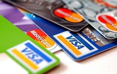 Тарифы сравнялись: обзор рынка платежных карт за 2014 год