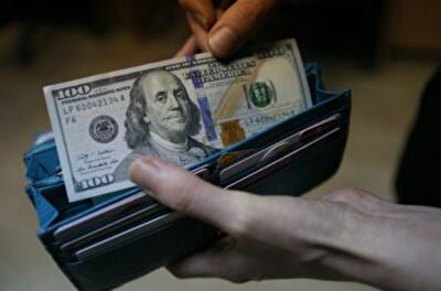 К концу года курс доллара официально подскочит до 13,7 грн 