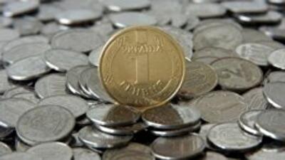 Девальвация гривни ожидается в августе